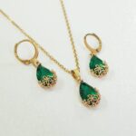 نیم ست طلایی مجلسی گوشواره و گردنبند استیل جواهر نشان سبز