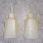 روغن چرخ خیاطی اورجینال 2 عددی